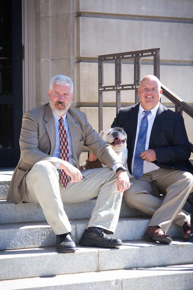 Brumback and Ottem lawyers on steps in Yakima
