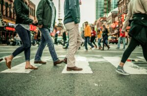 pedestrians-walking-across-a-crosswalk